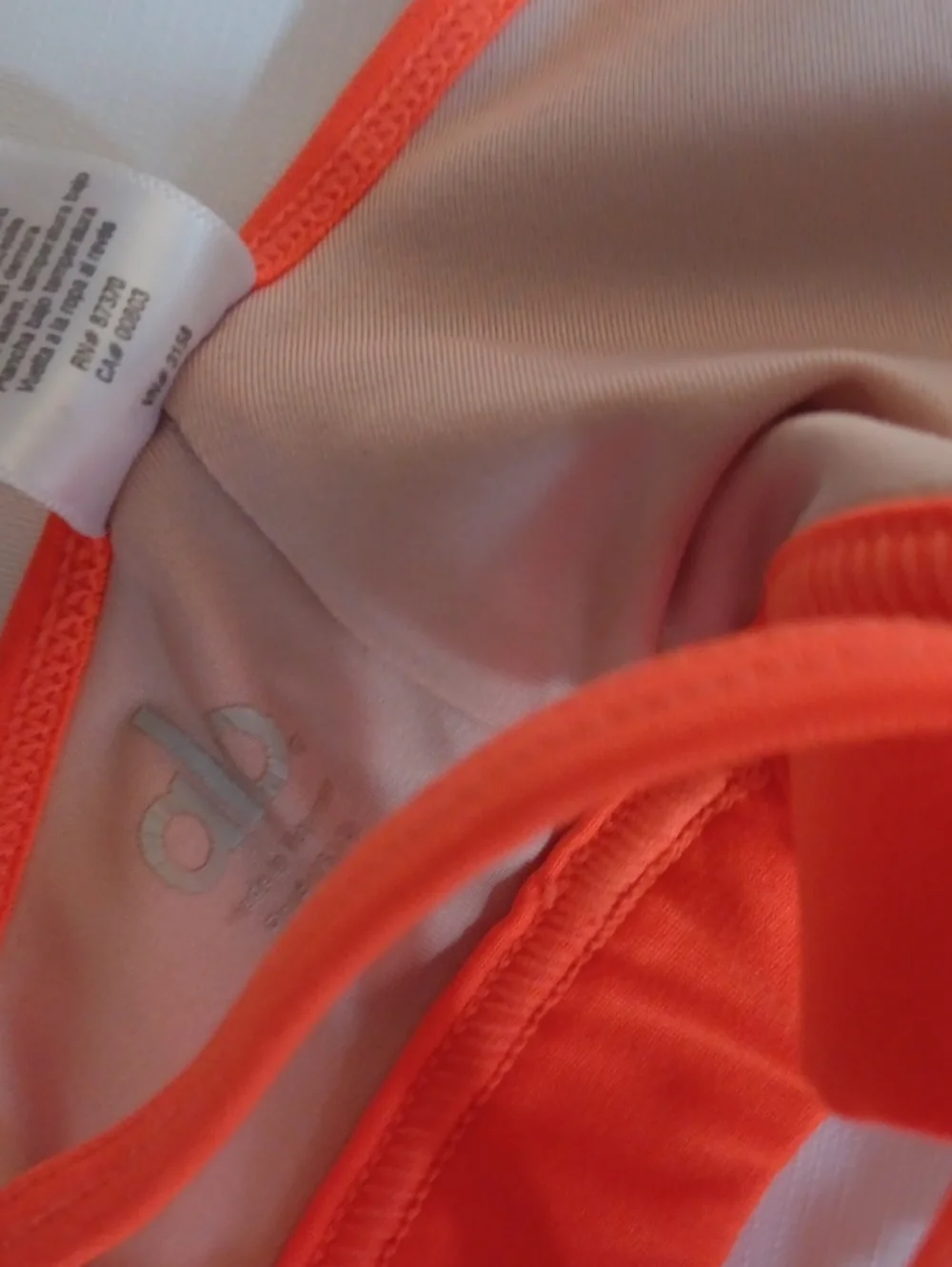 ALO Yoga White Bralette with Bright Coral Trim and Cross-Back Straps